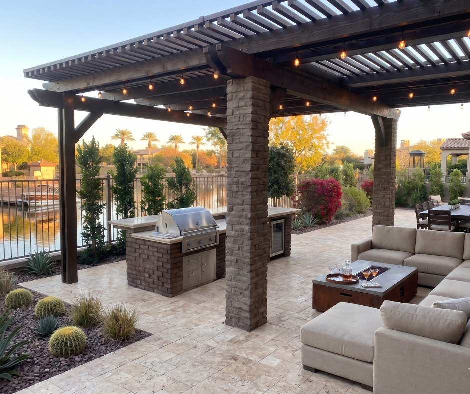 Gorgeous pergola with a kitchen underneath. You can see it's a slatted pergola with some desert plants in the background.